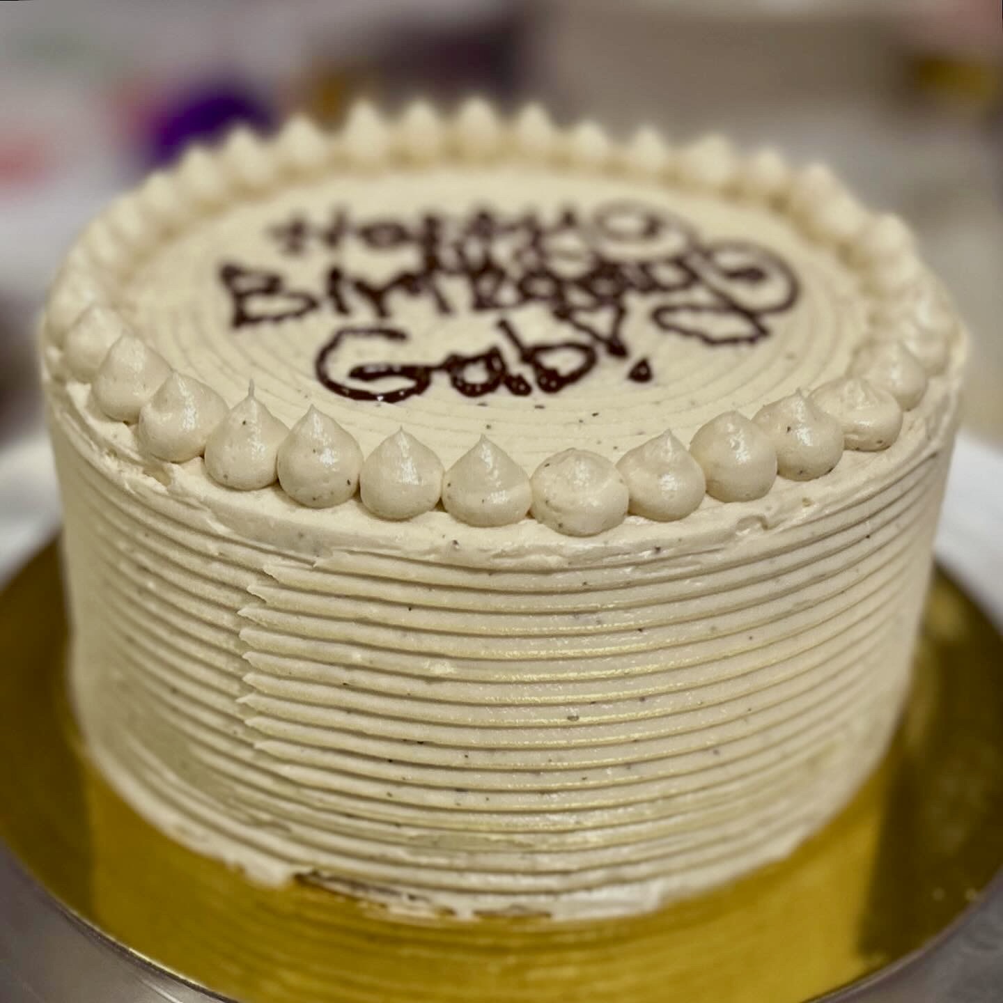 Classic vanilla sponge cake featuring a signature Earl Grey tea-infused London Fog buttercream by Sweet Dreams Cake Boutique.